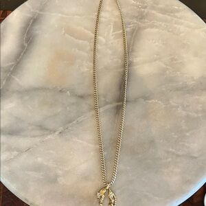 Curb link gold chain with panther